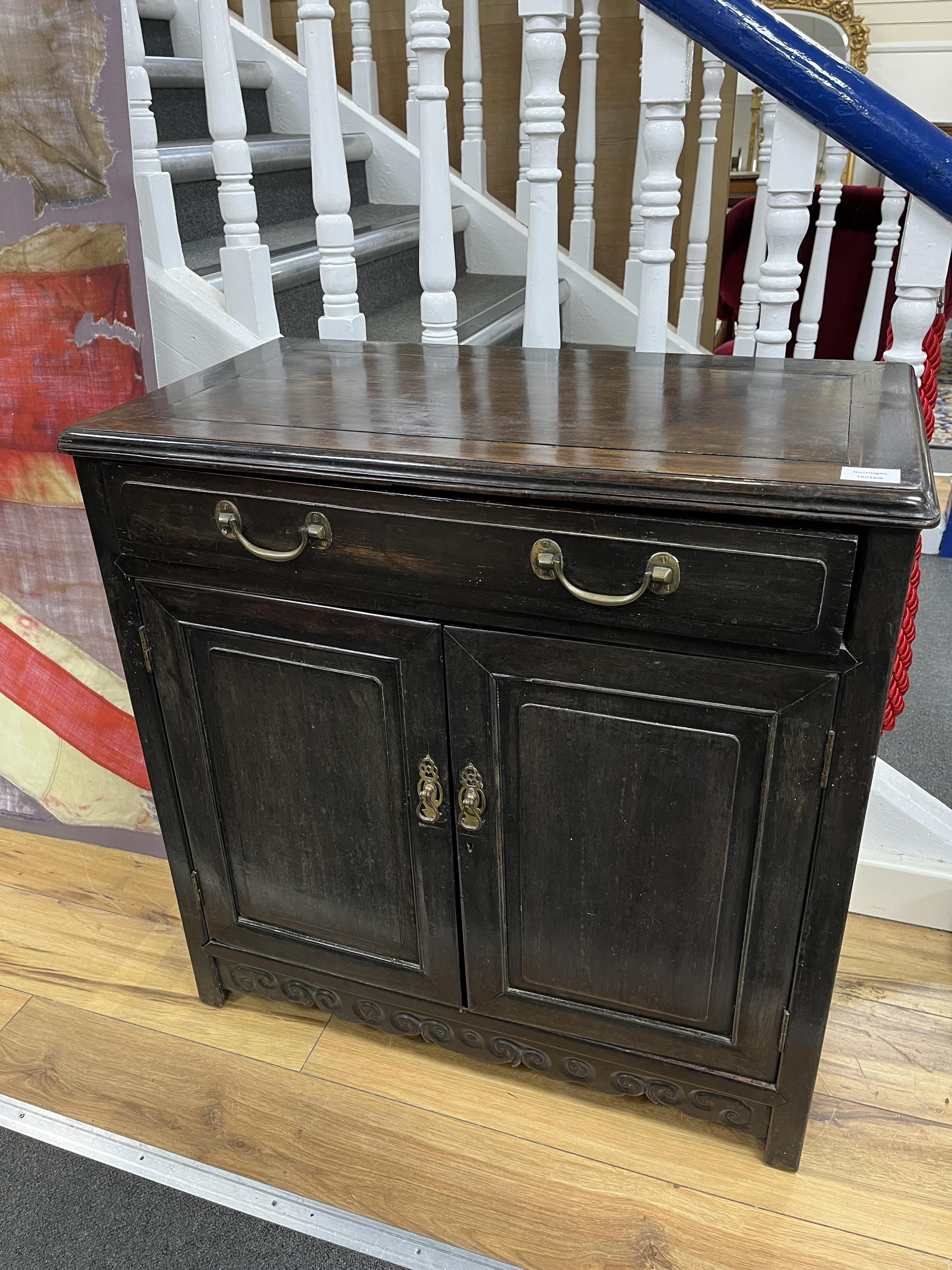 A Chinese hardwood low cabinet, width 77cm, depth 42cm, height 77cm. Condition - fair